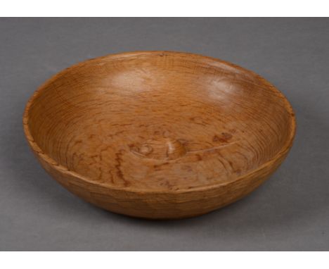 A ROBERT THOMPSON OF KILBURN 'MOUSEMAN' OAK FRUIT BOWL, of shallow circular form with central carved mouse motif, 28cm diamet