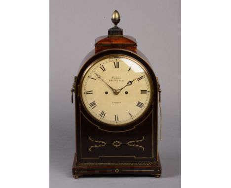 A LATE REGENCY BRASS BOUND AND INLAID MAHOGANY BRACKET CLOCK, by Robins, Charing Cross, London, the arched case with brass ac