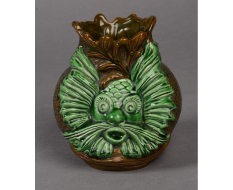 DR CHRISTOPHER DRESSER, A RARE AULT POTTERY FISH MASK VASE, c.1900, moulded with double fish head masks picked out in bright 