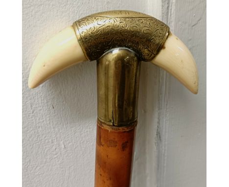 A late 19th/early 20th century walking stick, with engraved brass and ivory, 93 cm Ivory Exemption Registration - UQWLSMLM Pr