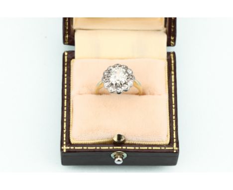 Old Cut Diamond Cluster Ring, the 1.75 ct central stone beset with 12 five-point diamond surround, SI1, colour approximately 