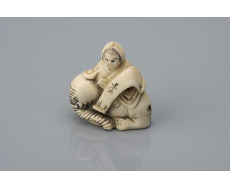 A Meiji Period Ivory Netsuke of Karako on a Resting Elephant, signed to the base and with character marks to the karako's sas