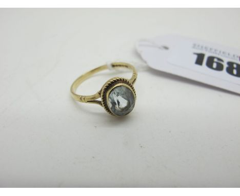 A Modern 9ct Gold Single Stone Dress Ring, oval collet set between bifurcated shoulders (finger size L) (1.5grams). 