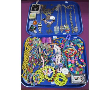 A Large Collection of Ornate Novelty and Brightly Coloured Costume Jewellery, including owl pendants on chains, similar earri