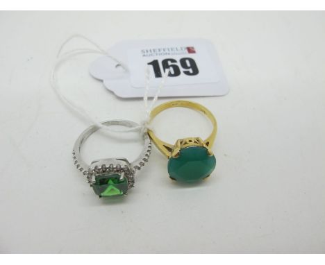 A Single Stone Dress Ring, circular claw set, stamped "18ct" (finger size Q) (4grams); Together with A Modern "925" Cluster D