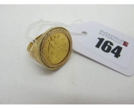 An Elizabeth II Half Sovereign 1982, (4 grams) in 9ct gold ring mount (finger size T) (5 grams).