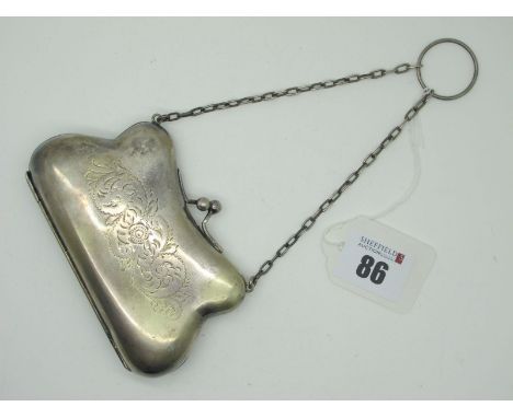 An EPNS Ladies Purse, of shaped design, green fabric lined, on chain suspension with finger ring. 