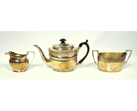 Regency silver composite 3 piece oval tea set with engraved floral and other decorated bands, by I.B., London 1803, 2-handled