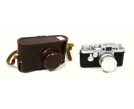 An Ernest Leitz Wetzlar Leica III camera body, serial No. 878902, with Leitz Summaron f 3.5 lens serial No. 1690550, in origi