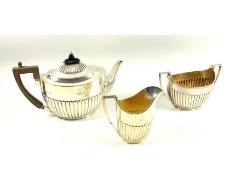 Late Victorian silver semi-fluted oval 3 piece tea set comprising a teapot, sugar basin and milk jug, each engraved with a wo