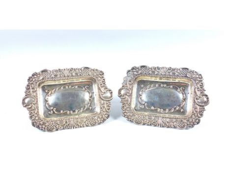 Pair of late Victorian silver rectangular sweetmeat dishes with chased and embossed scroll, floral and lattice decoration, by