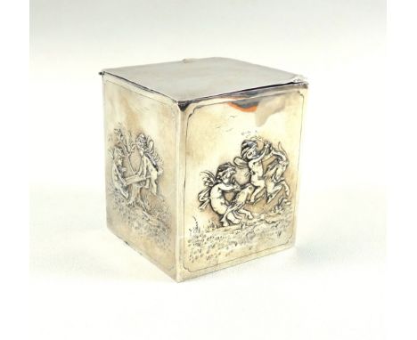 Edwardian silver square section tea caddy, the sides embossed with cherubs in various pursuits, with a plain hinged cover, 9.