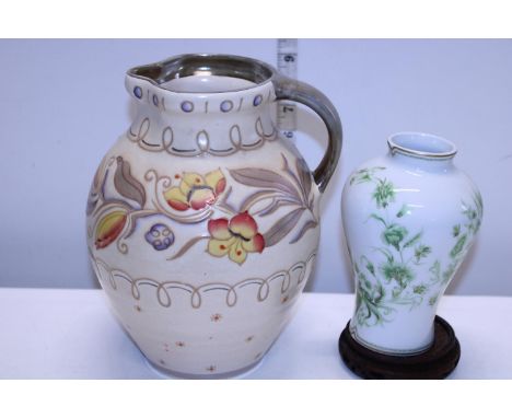 A large Charlotte Rhead jug and a Limoge vase on stand 