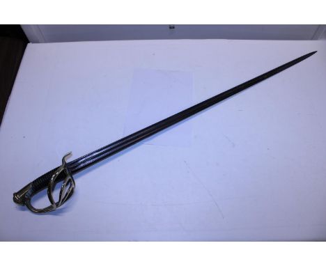 A French Cuirassiers/Dragoons sword with date marks for around 1850 with possible earlier blade. Etching on blade and proof m