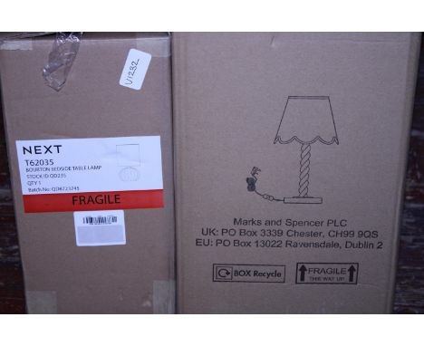 A boxed NEXT contemporary table lamp and a boxed Marks and Spencer's lamp (unchecked) 