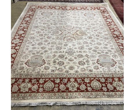 A Ziegler style ivory ground carpet, 320 x 274cm. Condition - fair to good