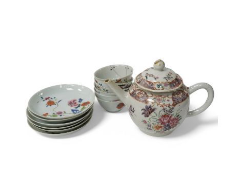 An 18th century Chinese porcelain teapot and a set of tea bowls and saucers, teapot 13cm high. Condition - mixed poor to fair