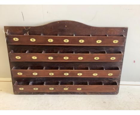 A vintage alphabetical wall mounted pigeon hole stand, width 96cm, height 60cm. Condition - fair
