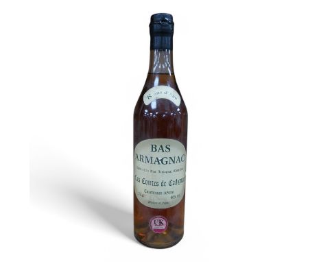 A bottle of Les Comtes De Cadignan Bas Armagnac. Condition - fair, from a local private cellar