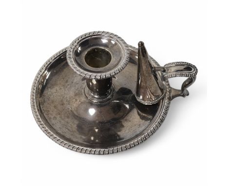 A late Victorian silver chamber stick, by Martin Goldstein, London, 1883, with associated silver extinguisher, base diameter 