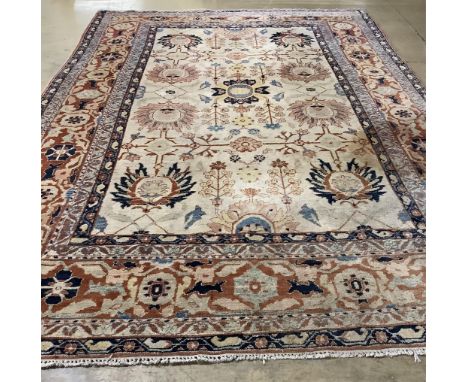 A Garous Zeigler style ivory ground carpet, 358 x 260cm. Condition - fair, one stained patch Dimensions: 358 x 260cm