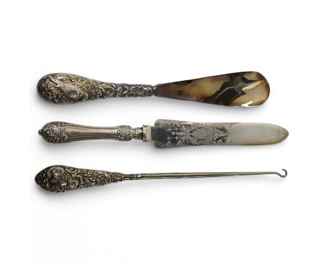 An Edwardian silver cake knife with engraved blade and decorative handle, James Deakin &amp; Sons, Sheffield, 1901, together 