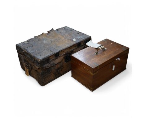 A Studded trunk and a brass bound box. Condition - poor 60 wide x 38 deep x 27 tall (cm)46.5 wide x 27 deep x 23 tall (cm)