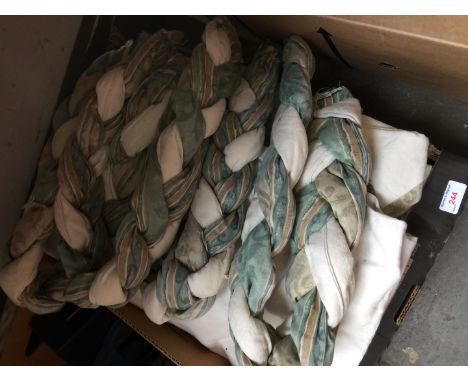 A box containing 2 sets of curtains, swags and tie backs 