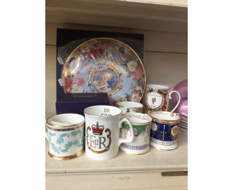 Royal commemorative china comprising a Royal Albert Woman of the Century plaque, Royal Worcester mugs etc. 