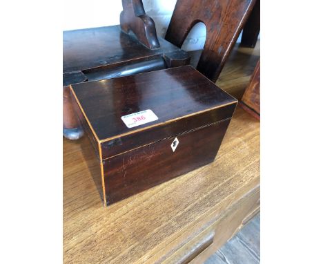 A Georgian boxwood strung mahogany tea caddy. 