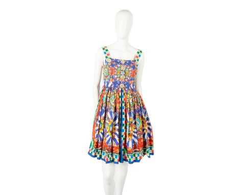 Cotton pipeline cocktail dress detailed with Carretto Sicilian print, thick straps, and square neck. Completed with daisy-sha