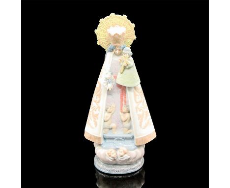 Handmade, glazed figurine of our lady with religious iconography and children. Colored in soft pastels. Nao by Lladro backsta