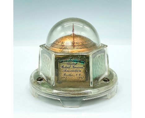Unique glass domed thermometer giving by the, "United Retail Grocers Association," from Brooklyn, NYC. Brass base is stamped 