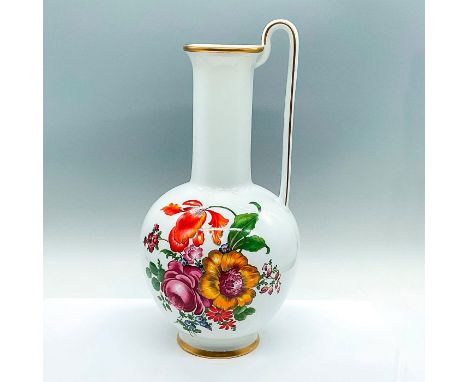 A large white ground pitcher with wildflowers and gild accents. Gerold Porzellan backstamp and marked 7919. Dimensions: 8"W x
