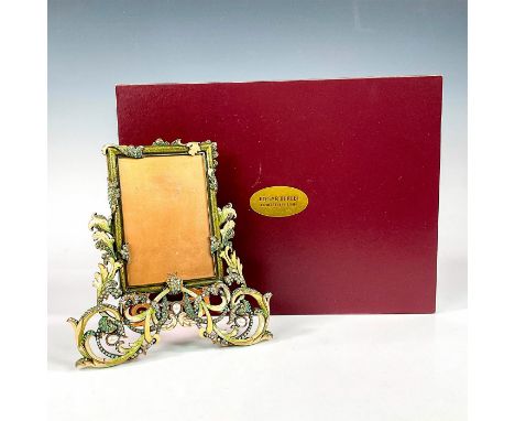 A stunning museum gold plated foliage frame adorned in a peridot glaze enamel, and olivine and peridot crystals. Edgar Berebi