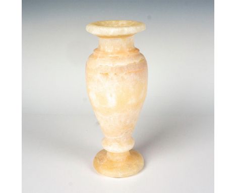 Stone vase with flared rim, round tapered body, and flared base. Stone is a light tan with white and peach striations. Made i