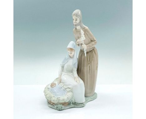 Glossy figure of Jesus, Mary, and Joseph. Nao by Lladro backstamp. Dimensions: 5.5"L x 3.75"W x 8.5"HManufacturer: Nao by Lla