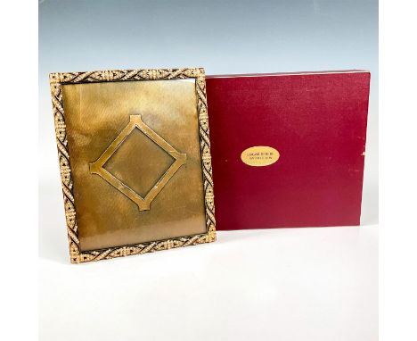 An impressive museum gold plated picture frame adored with topaz, peach, and silk Swarovski crystals. Edgar Berebi embossed p