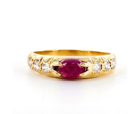 Petite oval ruby cabochon set in 4 prongs, and six round brilliant-cut diamonds. 2.24g of 20k tested gold. Size 5.75. Conditi
