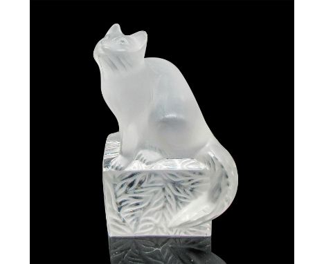Frosted figural looking up on clear fern designed crystal base. Model 11675. Artist: Marie-Claude LaliqueDimensions: 2.75"L x