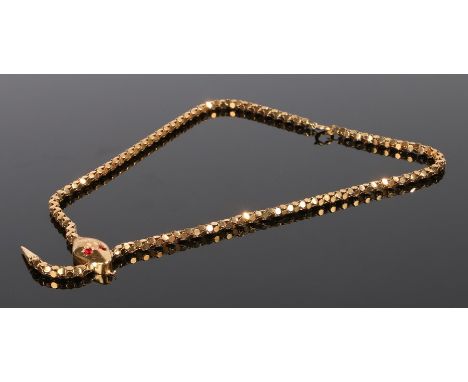 18 carat gold and ruby set necklace, in the form of a snake holding onto it's own tail, set with rubies to the eyes, 16.3 gra