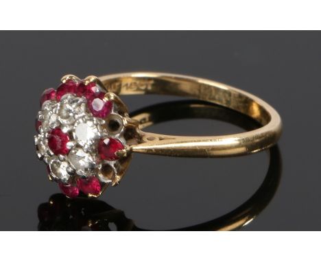 18 carat gold diamond and ruby set ring, in the form of a flower head, two rubies missing, ring size N 1/2