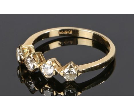 18 carat gold diamond set ring, with four diamonds to the head, ring size M 1/2