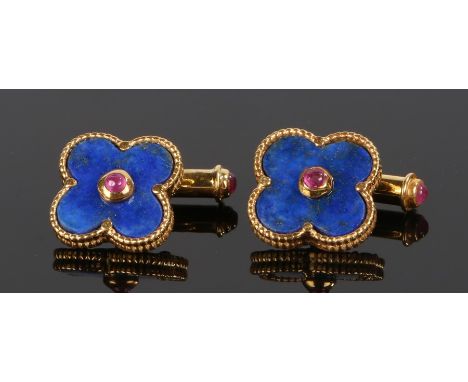 Pair of lapis lazuli and ruby cufflinks, with leaf heads centred by a ruby to gilt metal backs