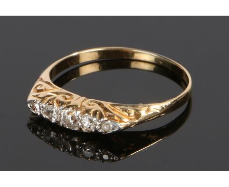 18 carat gold diamond set ring, with a row of five round cut diamonds, ring size N