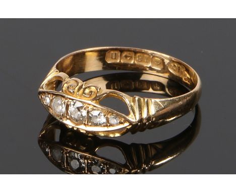 18 carat gold diamond set ring, with five diamonds to the head, ring size R