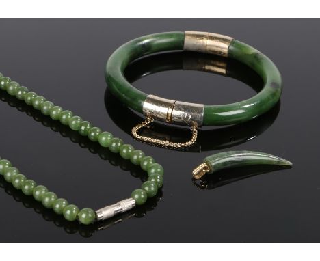 Chinese jade jewellery, to include a bangle, pedant and a necklace, (3)