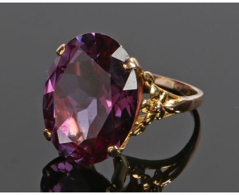 9 carat gold amethyst ring, the oval facetted amethyst within a four claw mount, ring size P