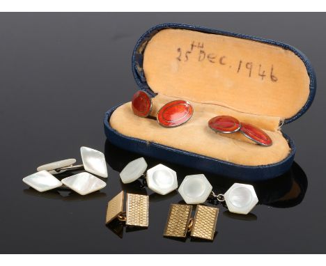 Pair of silver and enamel cufflink, with red guilloche enamel heads, together with a gold plated pair and two mother of pearl