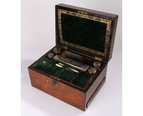 Victorian rosewood vanity box, the rectangular hinged lid opening to reveal silver and silver plated capped bottles and tools